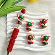Silicone focal beads featuring a cute red fox wearing a green hat. Soft, durable, and flexible, perfect for beadable pens, keychains, and handmade crafts.