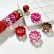 Diamond rhinestone metal bead caps and spacer findings designed to fit 20mm beads. Sturdy, shiny, and glamorous, perfect for beadable pens, keychains, and handmade crafts.
