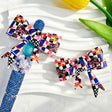 Bow-shaped silicone focal beads featuring an energy drink can print design. Soft, durable, and flexible, perfect for beadable pens, keychains, and handmade crafts.