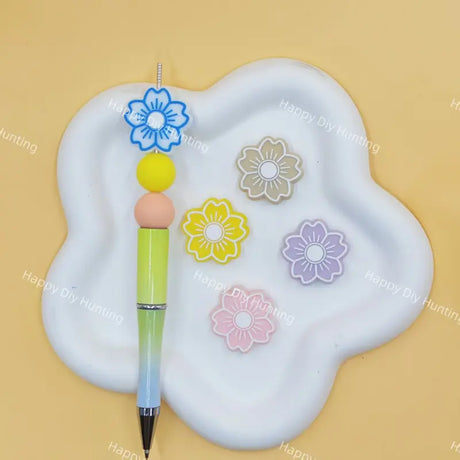 Multi-color outlined flower silicone focal beads for custom beaded pen making