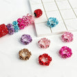 Flower rhinestone metal bead caps and spacer findings designed to fit 18mm beads. Sturdy, shiny, and elegant, perfect for beadable pens, keychains, and handmade crafts.