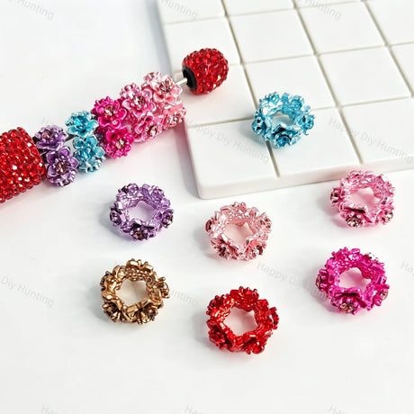 Flower rhinestone metal bead caps and spacer findings designed to fit 18mm beads. Sturdy, shiny, and elegant, perfect for beadable pens, keychains, and handmade crafts.