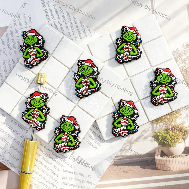 green christmas creature with santa hat silicone focal beads with holiday lights for diy beadable pen handmade holiday craft wholesale