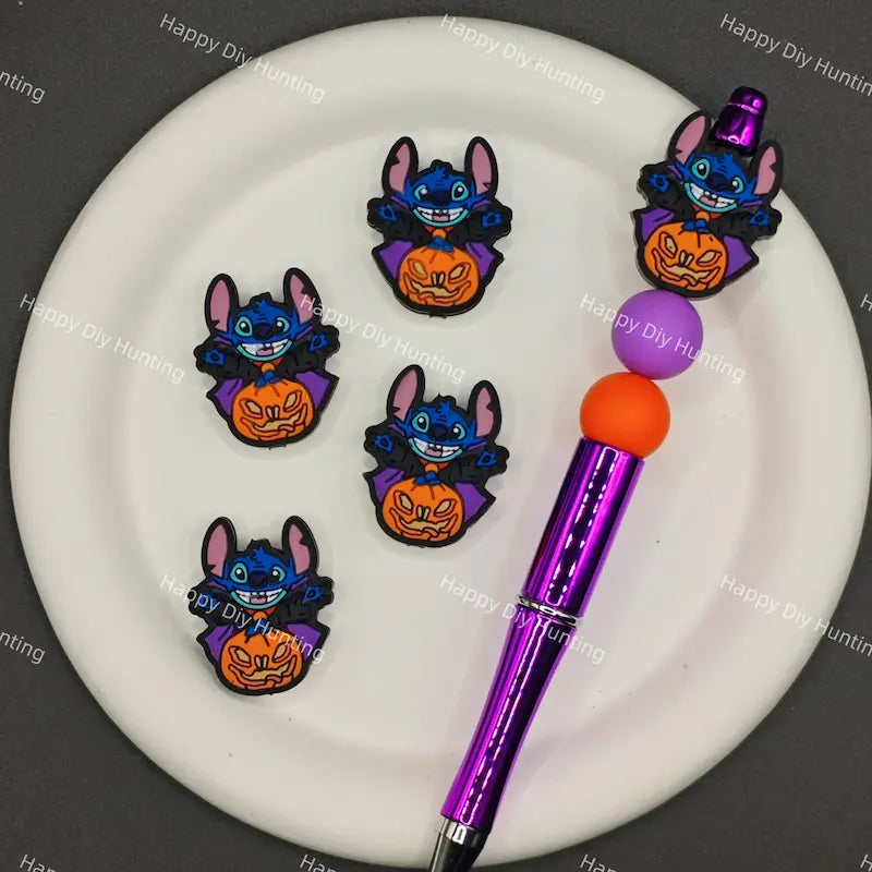 Halloween cartoon blue stitch silicone focal beads dressed as vampire with purple cape and jack o lantern pumpkin, match spacer beads for DIY handmade beadable pen holiday crafts.