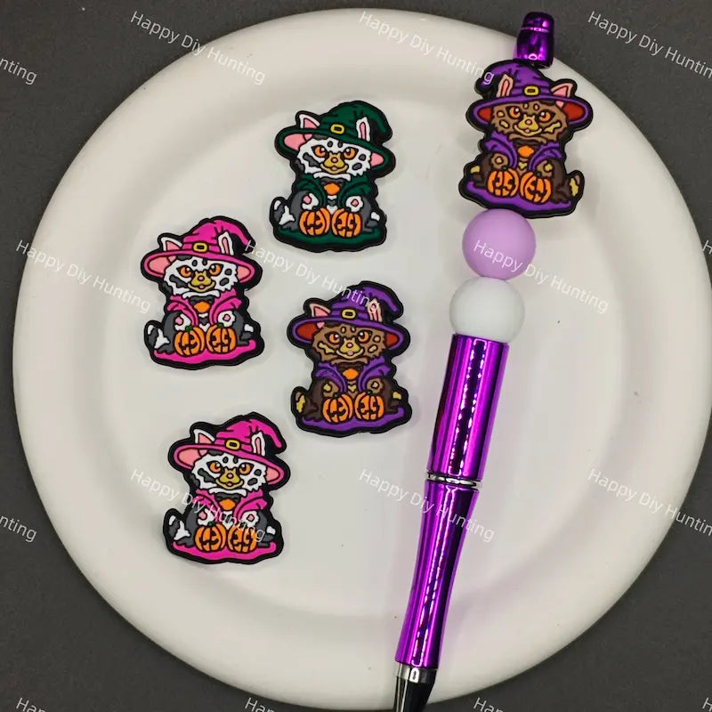 Halloween cartoon witch cat silicone focal beads holding pumpkins, match spacer beads for DIY handmade beadable pen holiday crafts.
