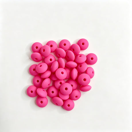 Hot pink round acrylic spacer beads. Smooth, lightweight, and colorful, perfect for beadable pens, keychains, and handmade crafts