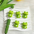 Silicone focal beads featuring a kawaii 3D green frog design. Soft, durable, and flexible, perfect for beadable pens, keychains, and handmade crafts.