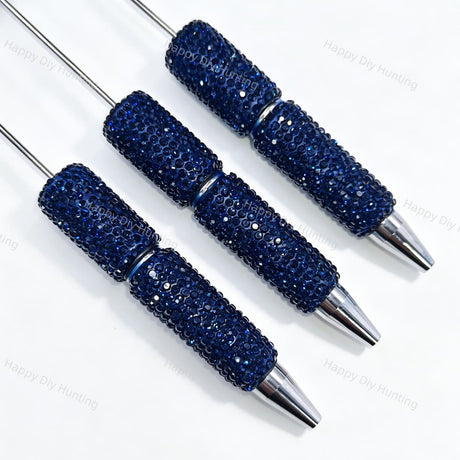 Three midnight blue rhinestone beadable pens displayed on a white surface. Each pen features a midnight blue rhinestone-encrusted barrel and a silver metal tip. Perfect for DIY beadable pen projects, custom crafts, and handmade gifts.