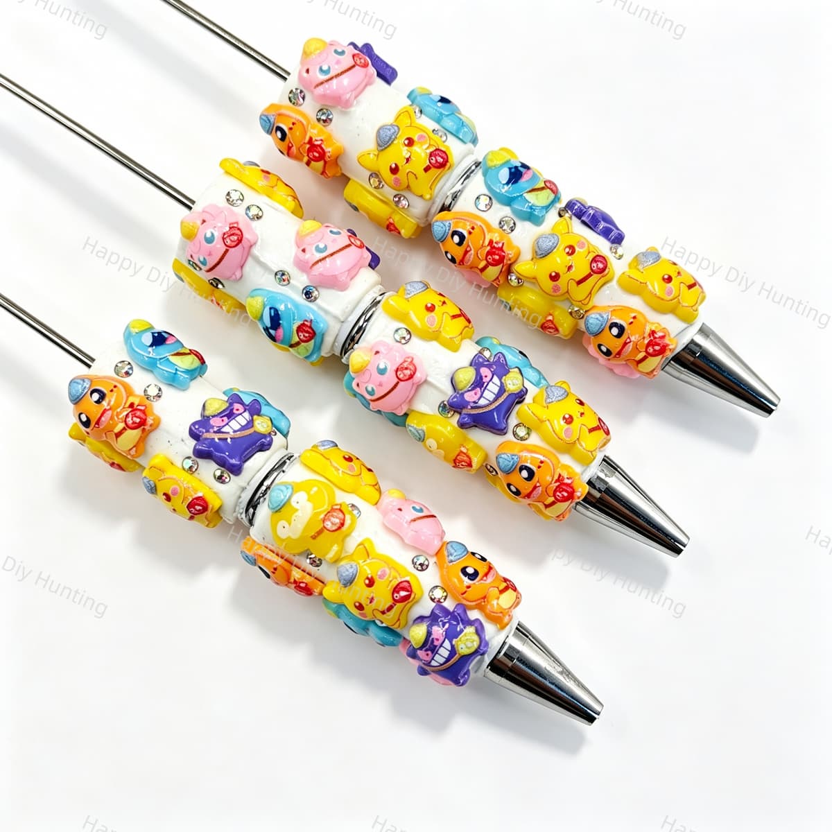 Mixed color cartoon monster character beadable pens. Refillable and customizable, matching all focal beads and pen toppers. Perfect for DIY crafts, handmade gifts, and craft fair retail.