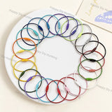 Multicolor cup shaped metal charm wire hardware, used for DIY beadable keychains, wristlets, handmade bracelets and custom bead pen decorations.