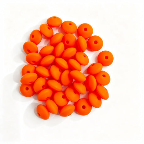 Orange round acrylic spacer beads. Smooth, lightweight, and colorful, perfect for beadable pens, keychains, and handmade crafts.