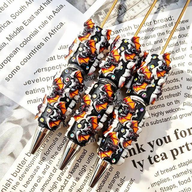 black base orange‑white spooky bat graphic decorated beadable pens for halloween diy handmade craft stationery wholesale
