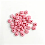 Pearl pink round acrylic spacer beads with a glossy pearl finish. Smooth, lightweight, and colorful, perfect for beadable pens, keychains, and handmade crafts.