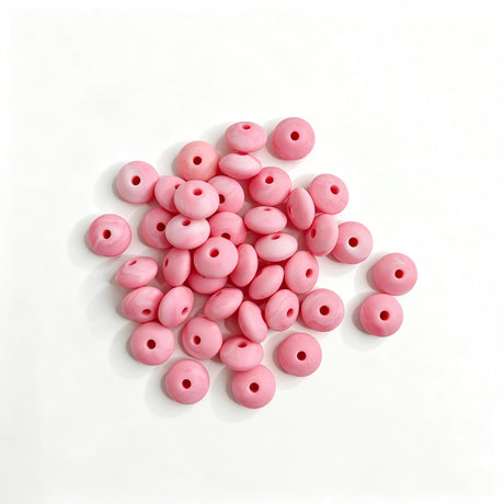 Pearl pink round acrylic spacer beads with a glossy pearl finish. Smooth, lightweight, and colorful, perfect for beadable pens, keychains, and handmade crafts.