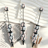 pre‑assembled pink‑bow white cartoon cat 3D figurine beadable pens, sleek black base decorated with faux pearls, cute kawaii‑style craft ballpoint pens bulk