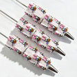 Pink bow cartoon duck character beadable pens. Refillable and customizable, matching all focal beads and pen toppers. Perfect for DIY crafts, handmade gifts, and craft fair retail.