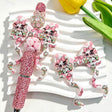 Bow-shaped silicone focal beads featuring a pink cow holding a coffee cup print design. Soft, durable, and flexible, perfect for beadable pens, keychains, and handmade crafts.