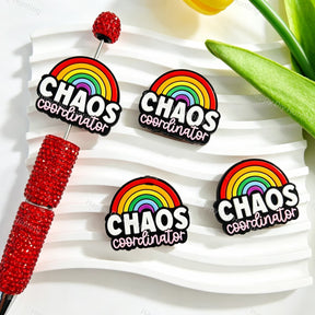 Silicone focal beads featuring a rainbow and "Chaos Coordinator" quote print design. Soft, durable, and flexible, perfect for beadable pens, keychains, and handmade crafts.