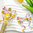 Silicone bow beads featuring a rainbow animal print design. Soft, durable, and flexible, perfect for beadable pens, keychains, and handmade crafts.