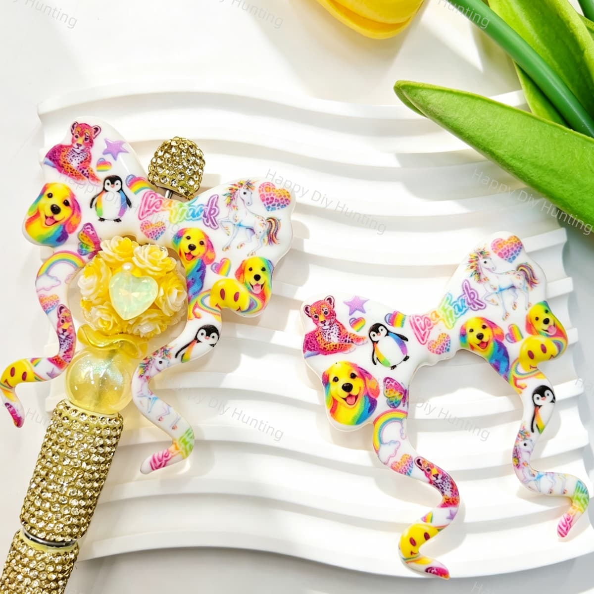 Silicone bow beads featuring a rainbow animal print design. Soft, durable, and flexible, perfect for beadable pens, keychains, and handmade crafts.