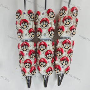pre‑assembled red‑cap plumber‑style 3D character figurine beadable pens with embedded sparkling rhinestones bulk fun themed craft ballpoint pens