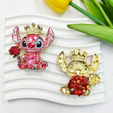 Red and pink crown alien metal fancy bead with rhinestones shown from the front and back. The front features a colorful faceted alien design holding a rose, while the back shows a gold metal finish. Perfect for DIY beadable pens and crafts.