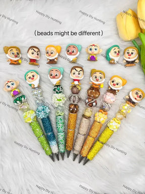 Full set of 7 handmade pre-made bling bead pens with Seven Dwarfs figurine pen toppers, each pen features unique colored rhinestone barrel, assorted floral & crystal focal beads, bead arrangements vary slightly on every pen, wholesale DIY craft beadable pen supplies