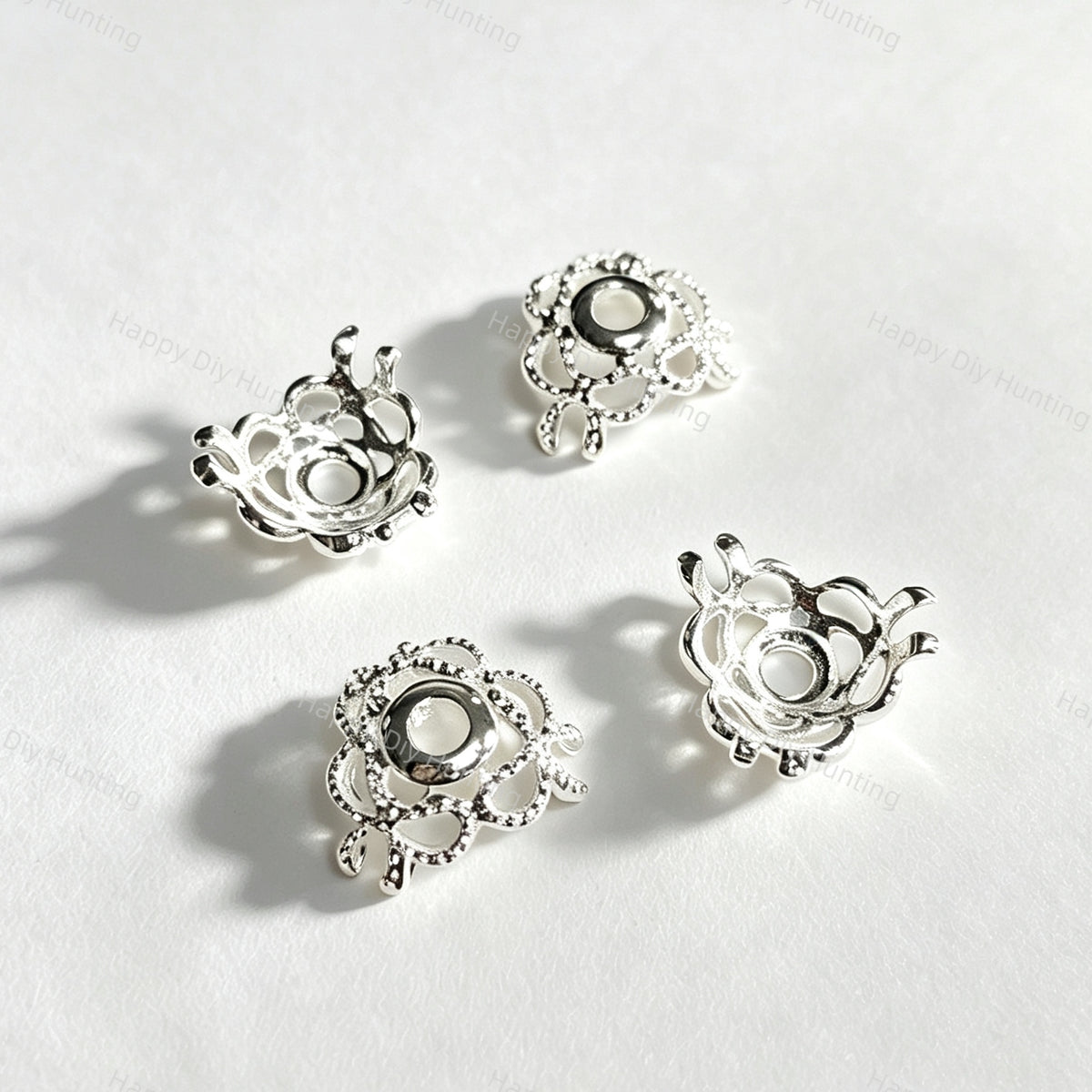 Silver plated hollow bow-shaped bead caps and spacer findings. Lightweight, shiny, and durable, perfect for beadable pens, keychains, and handmade crafts.