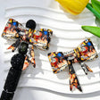 Bow-shaped silicone focal beads featuring a TV show scene collage print design. Soft, durable, and flexible, perfect for beadable pens, keychains, and handmade crafts.