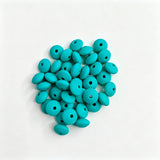 Teal round acrylic spacer beads. Smooth, lightweight, and colorful, perfect for beadable pens, keychains, and handmade crafts.