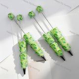 vibrant lime green whimsical cartoon character print beadable pens for diy silicone focal bead craft wholesale