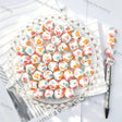 White base full print round silicone beads with pastel multicolor cat paw print patterns for diy handmade beadable pen wholesale craft jewelry accessories