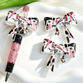 Bow-shaped silicone focal beads featuring a white cute hair salon tool design. Soft, durable, and flexible, perfect for beadable pens, keychains, and handmade crafts.