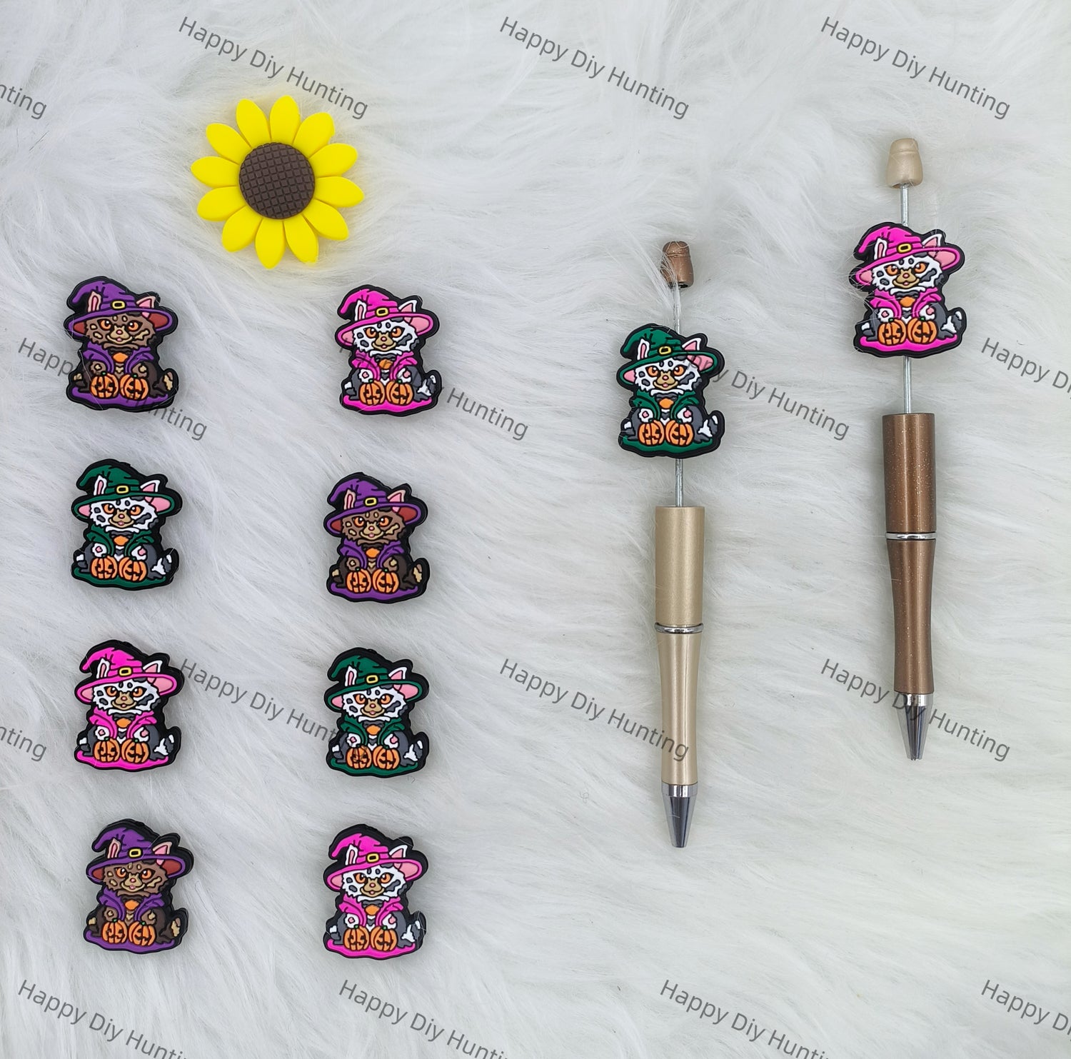 a cat holding a pumpkin silicone focal beads for pens 