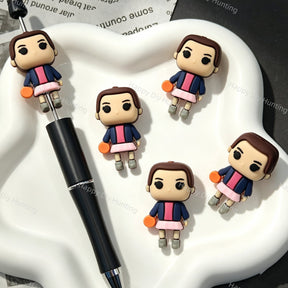 Ball‑holding cartoon girl 3D silicone focal beads, cute 3‑dimensional girl character silicone beads for beadable pens and DIY keychain craft projects.