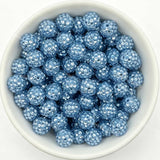 Light blue rhinestone beads in matte white bowl, white background, top‑down view, high‑resolution product photo