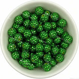 Light green rhinestone beads in matte white bowl, white background, top‑down view, high‑resolution product photo
