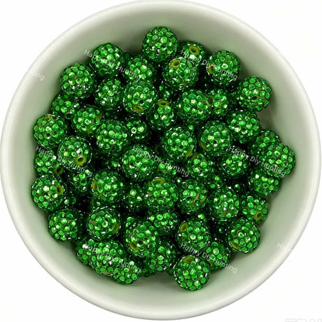 Light green rhinestone beads in matte white bowl, white background, top‑down view, high‑resolution product photo