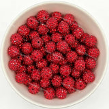 Red rhinestone beads in matte white bowl, white background, top‑down view, high‑resolution product photo