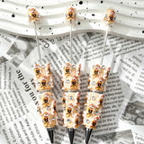 Beige little boy relief beadable pens, raised cartoon boy motifs with white trim and multi‑color rhinestones, diy craft pen blanks