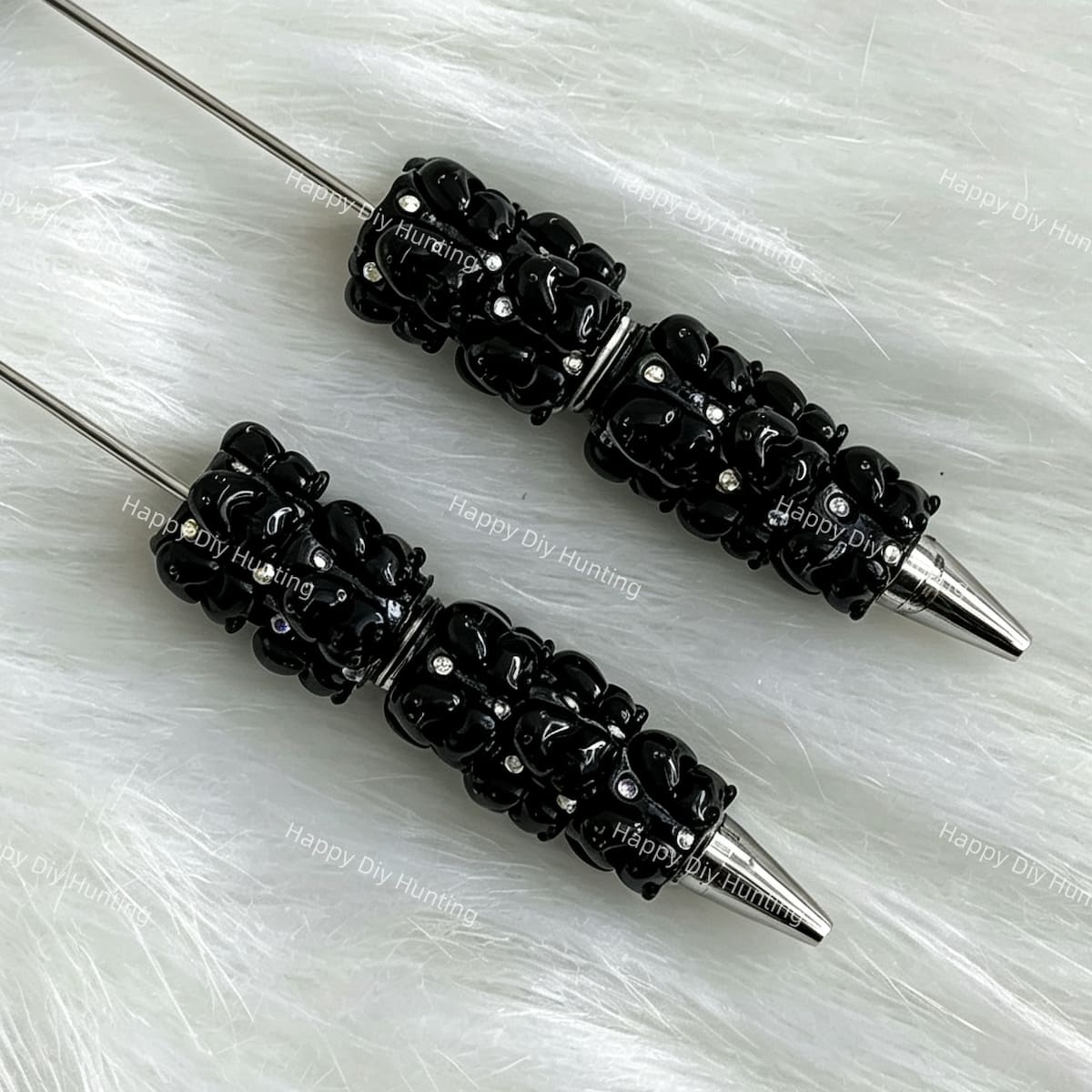 close-up black Richard beadable pen showing colorful Richard design and beadable barrel