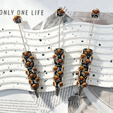 black base orange‑white spooky spider graphic decorated beadable pens for halloween diy handmade craft stationery wholesale