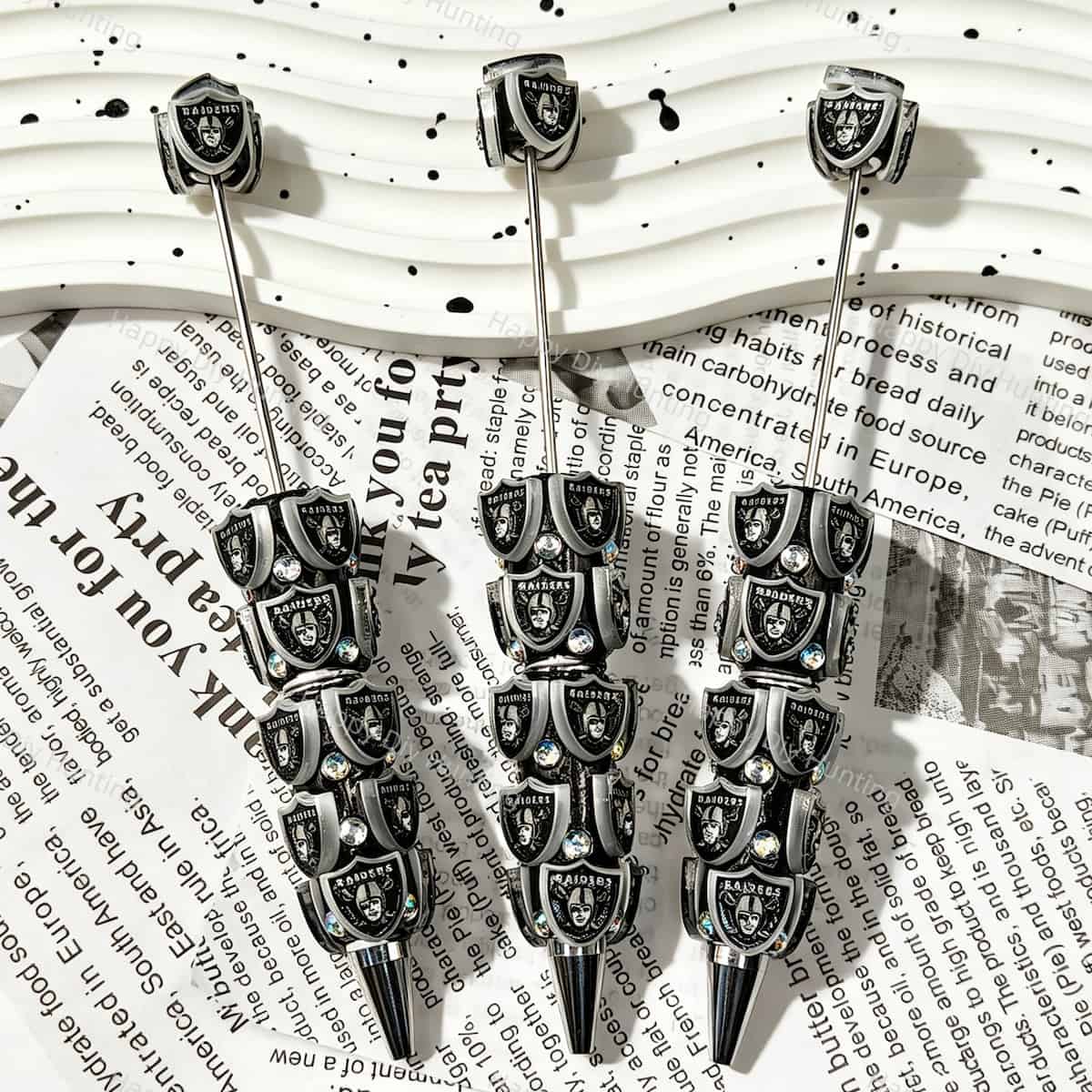 Black‑silver Raiders NFL Team sports beadable pens, diy pen blanks with shield emblem and multi‑color rhinestone accents for beadable pen handmade craft supplies