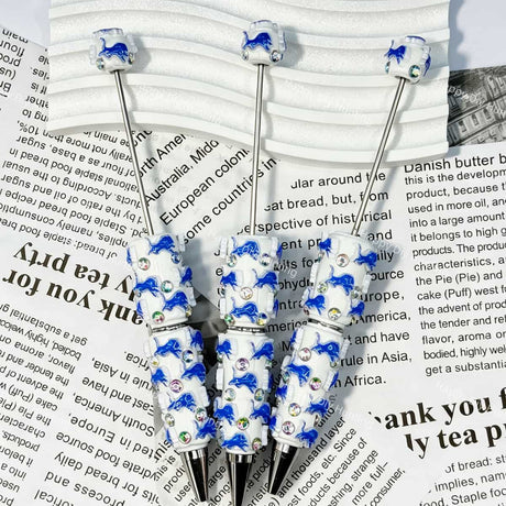 close-up blue wild-lion DL football beadable pen showing lion design and beadable barrel