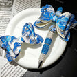 Blue‑white helmet print bow beads, decorative PU bow charms for beadable pens and handmade DIY craft projects
