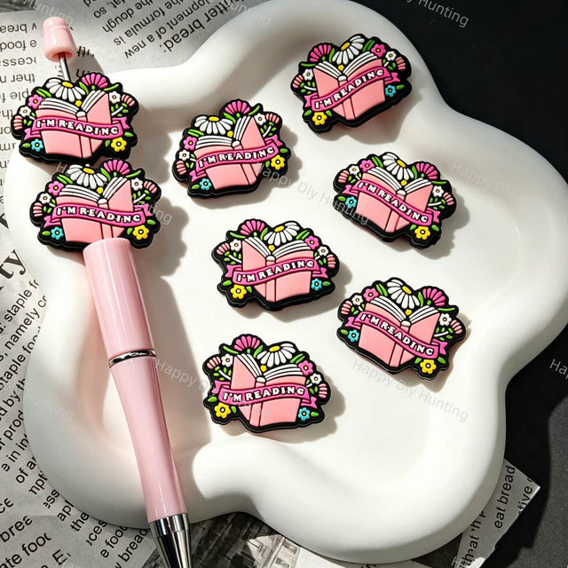 Book‑theme floral reading silicone focal beads, decorative silicone beads with open book and colorful flower prints for beadable pens and pen toppers DIY craft projects