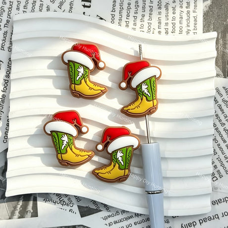 close-up christmas cowboy boot silicone focal bead showing festive western holiday design