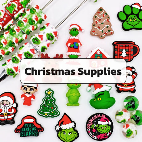 Christmas craft supplies collection with festive silicone focal beads, acrylic beads, toppers, and beaded pens.