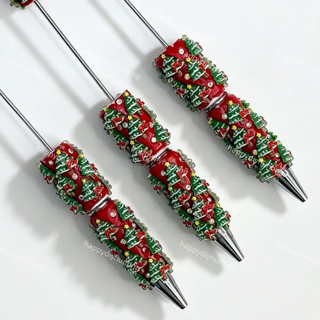 close-up Christmas tree beadable pen showing holiday tree design and beadable barrel