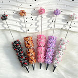 close-up colorful heart designer D*R beadable pen showing heart design and beadable barrel